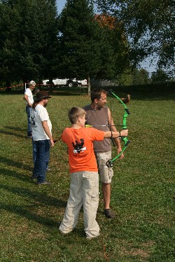 Youth shooting bow
